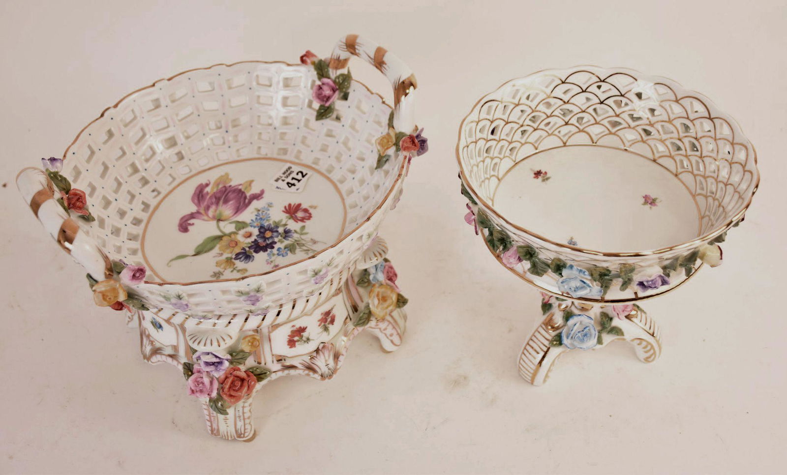 2 KPM Reticulated Centerpiece Bowls, One With Handles, Floral & Gilt Accents, Larger on Pedestal: 2 KPM Reticulated Centerpiece Bowls, One With Handles, Floral & Gilt Accents, Larger on Pedestal Base (8 1/2"h x 10"dia), (7 1/2"h x 8"dia)
