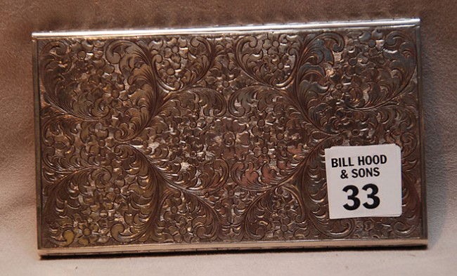 Sterling hinged cigarette case, 5 1/2"L x 3 1/4"W: Sterling hinged cigarette case, 5 1/2"L x 3 1/4"W