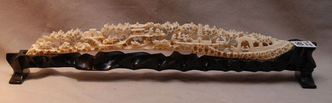 Intricately carved tusk, 13 1/2"L: Intricately carved tusk, 13 1/2"L