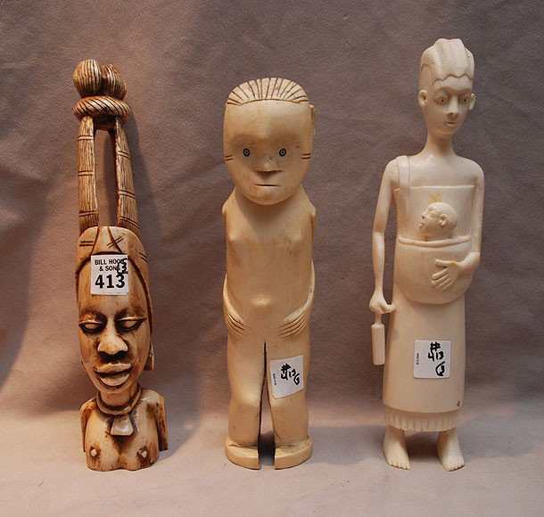 3 carved African figures, tallest is 12"h, shortes: 3 carved African figures, tallest is 12"h, shortest is 10 1/2"h