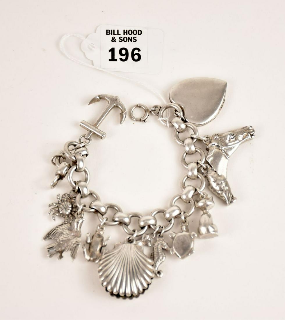 Sterling Silver Charm Bracelet With Charms. Size 7