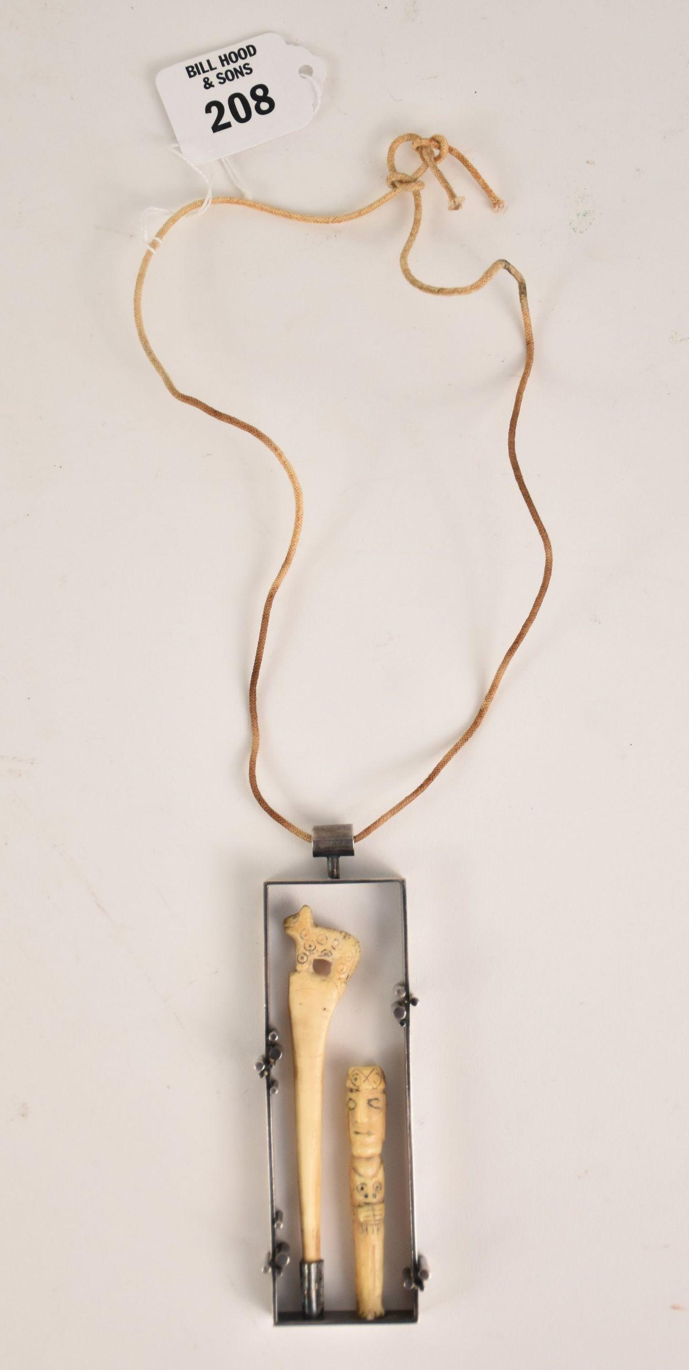 Easter Island Artifact Sterling Pendant. Marked Sterling Hans (Danish 1884-1940). Commissioned: Easter Island Artifact Sterling Pendant. Marked Sterling Hans (Danish 1884-1940). Commissioned either by Hans Hansen or designed by his son Carl Gustave. The heavy upright sterling frame 76.5 grams wa