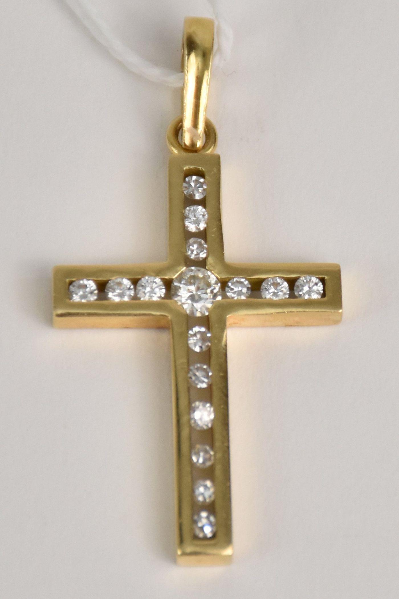 18Kt Yellow Gold Diamond Cross Pendant. 16 VS1 diamonds .70 tcw, size 1.5" x .75" weight 5.9 grams: 18Kt Yellow Gold Diamond Cross Pendant. 16 VS1 diamonds .70 tcw, size 1.5" x .75" weight 5.9 grams