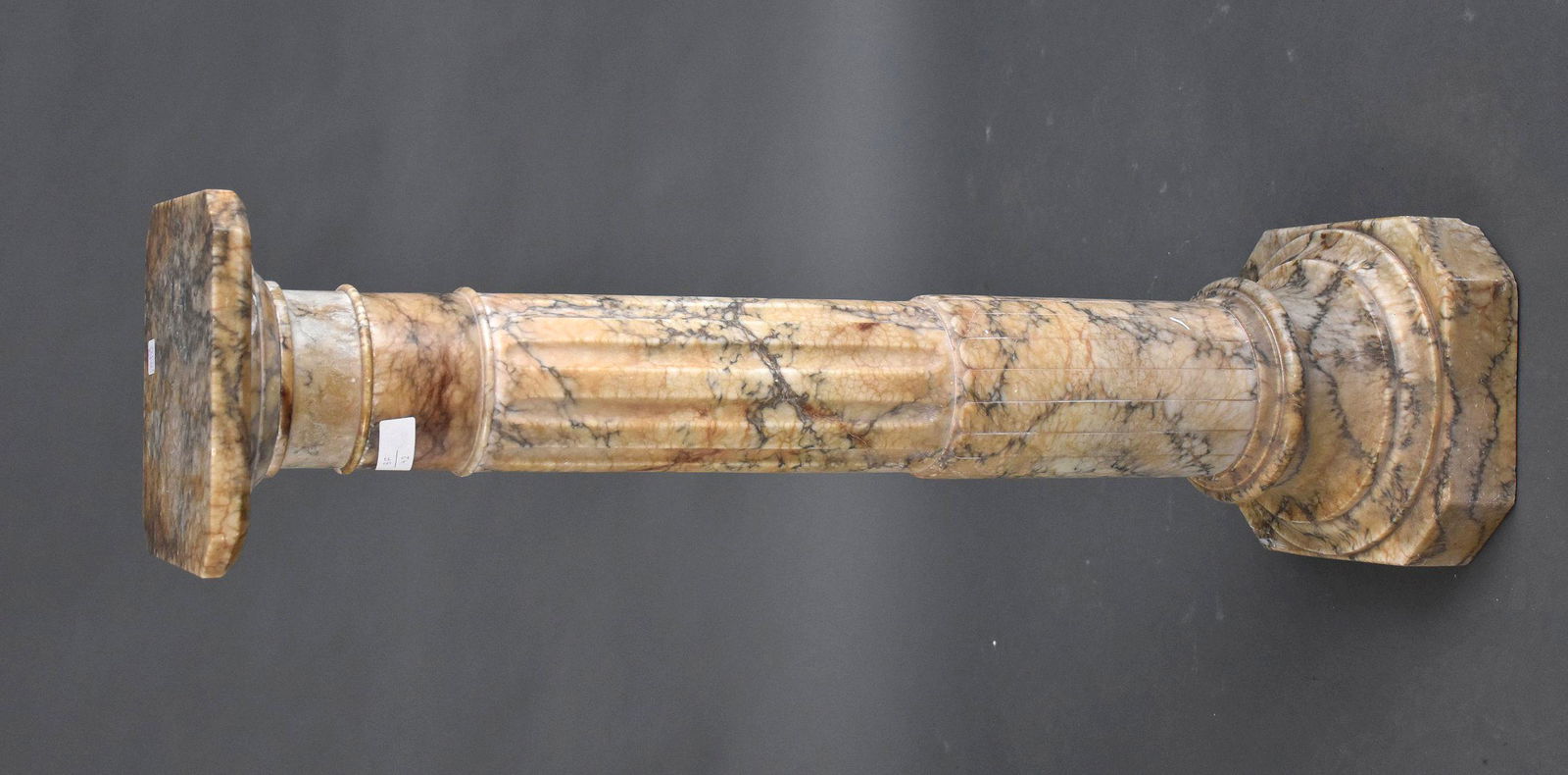 Marble Column-Form Pedestal - Continental 20th Century. Beige, grey, and black marble pedestal, with (1 of 3)