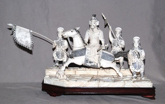 Large Chinese carved ivory Emperor on horseback and: Large Chinese carved ivory Emperor on horseback and 3 sentries guarding him, 10 1/2"h x 15 1/2"w