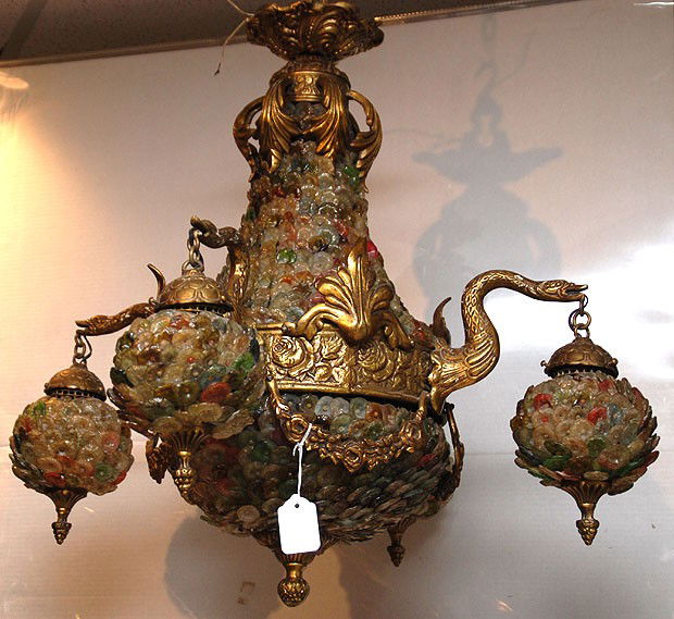 Unusual bronze 4 light chandelier with serpent ty: Unusual bronze 4 light chandelier with serpent type arms and drape design with predominately clear, green & rose colored glass discs covering body