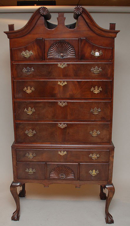 Antique American Mahogany highboy, swan neck pedim: Antique American Mahogany highboy, swan neck pediment over 3 side by side drawers, fan carved center over 4 graduated drawers, bottom case has long drawer over 3 side by side drawers and fan on center