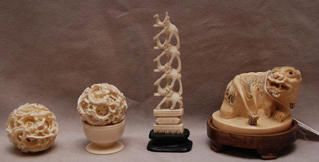 4 pcs. Carved ivory, 4 piggy back elephants (4 3/4: 4 pcs. Carved ivory, 4 piggy back elephants (4 3/4"h) foo lion/dog stamp (2"h) and 2 mystery balls