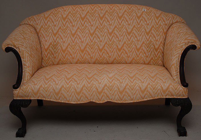 Chippendale style settee, rolled arms, higher back: Chippendale style settee, rolled arms, higher back and carved mahogany frame, carved and shaped legs, 37"h x 60"w x 28"d