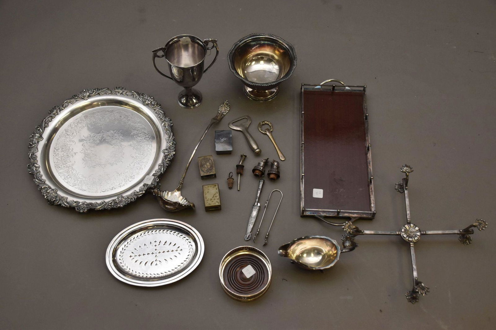 Lot of Silverplate Tablewares & Bar Tools, incl; Crossbar, Round Tray, Strainer, Wine Coaster, Sauce: Lot of Silverplate Tablewares & Bar Tools, incl; Crossbar, Round Tray, Strainer, Wine Coaster, Sauce Boat, Ladle, Trophy 1969, Bowl with Mahogany Bottom and Bar Misc.