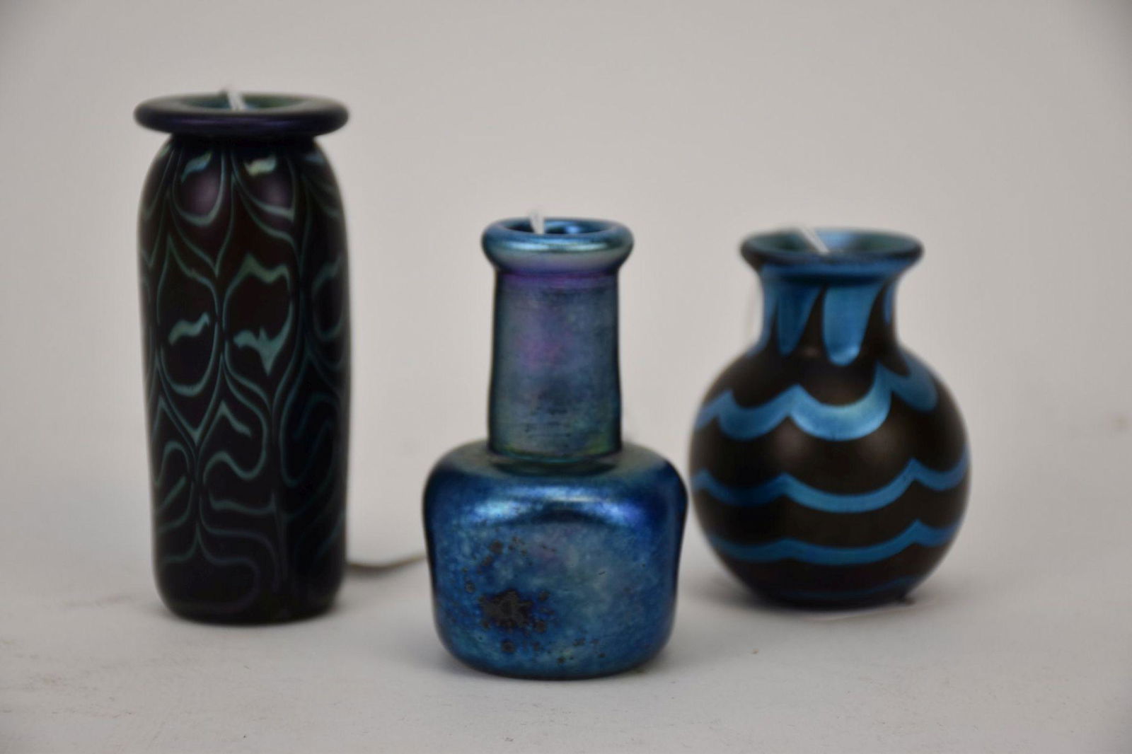 Three Mark Peiser (b. 1938) Studio Iridescent Art Glass Vases - American, 1975. Group of small (1 of 3)