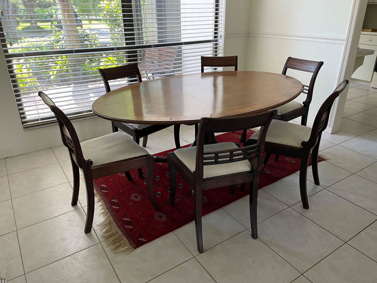 Late Georgian Mahogany Oval Breakfast Table cross-banded in rosewood with             boxwood and (1 of 6)