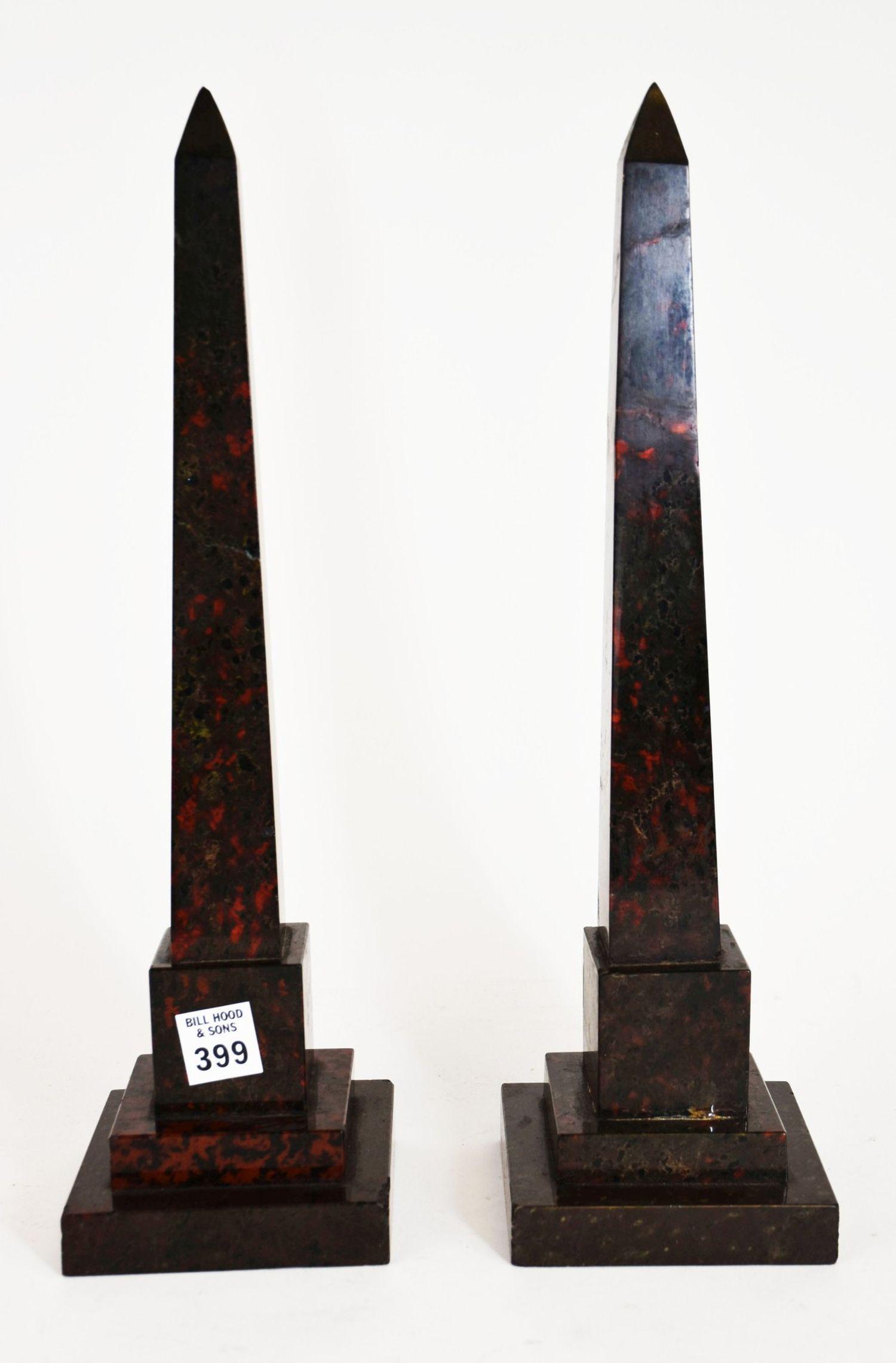 Pair Granite Obelisks - a pair of Ox Blood granite obelisks. 15 1/2" h. Condition: Some small chips: Pair Granite Obelisks - a pair of Ox Blood granite obelisks. 15 1/2" h. Condition: Some small chips to each.