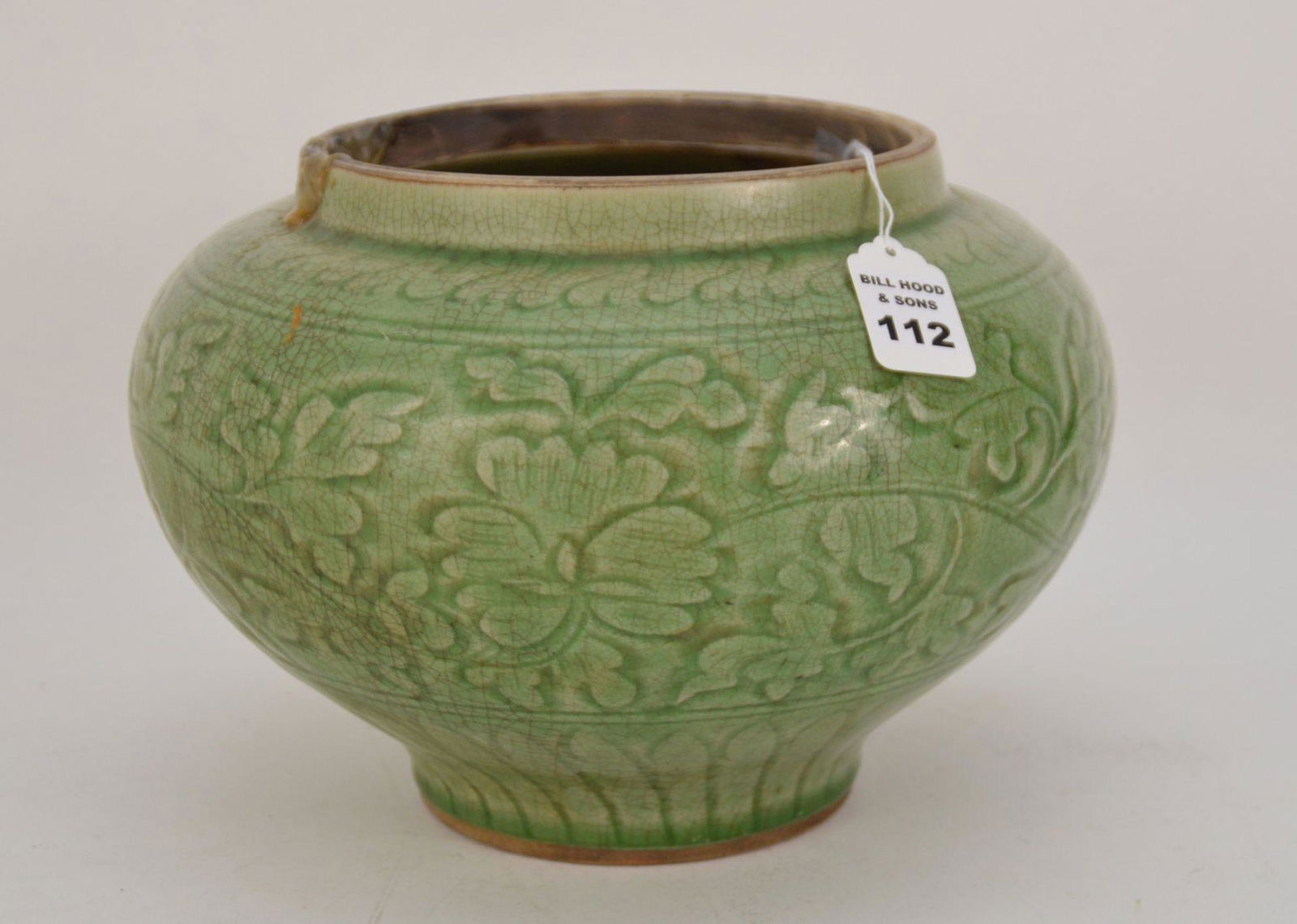 CHINESE CELADON GLAZED PORCELAIN POT W/ RELIEF - A Chinese porcelain jar with a bulbous body, green (1 of 5)