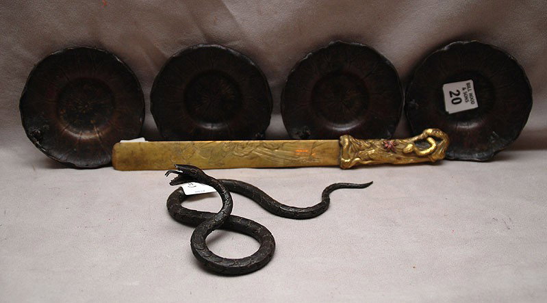 Iron snake sold together with 4 Japanese lily pad m: Iron snake sold together with 4 Japanese lily pad motif trays and mixed metal page turner, signed, 4"dia