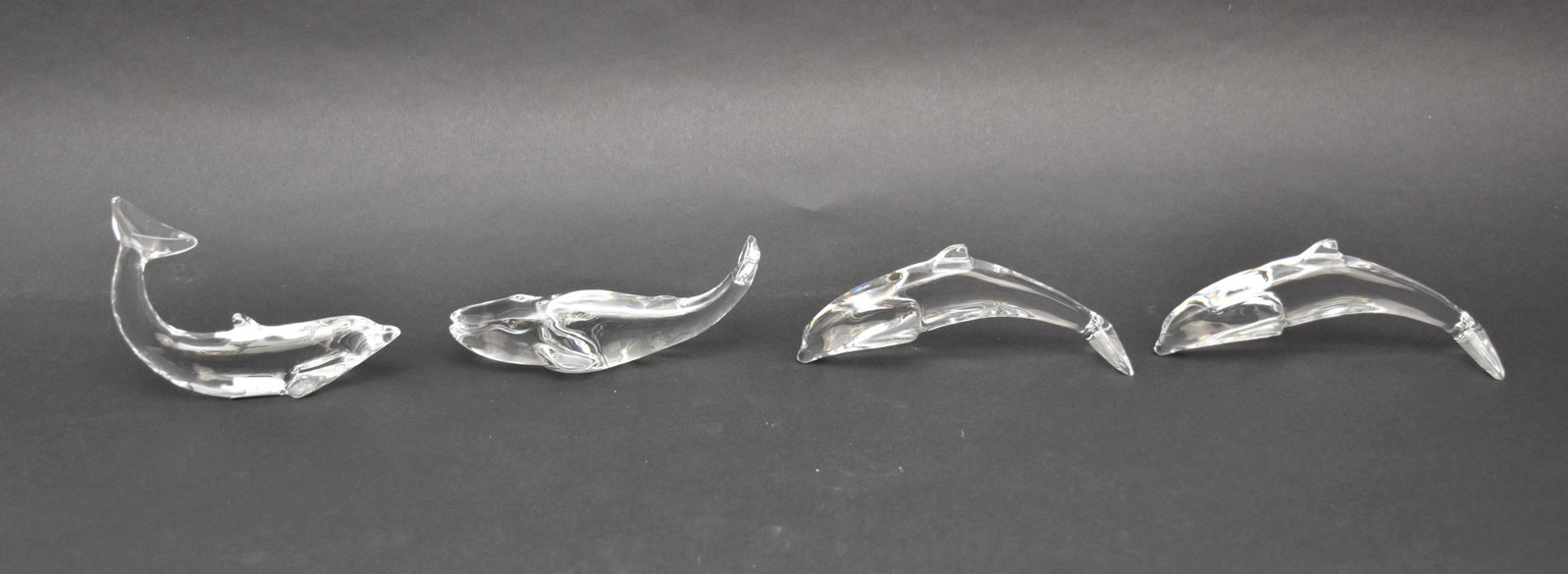 4 Baccarat Crystal Figurines. 3 Dolphins and 1 Whale approx. 6" in excellent condition: 4 Baccarat Crystal Figurines. 3 Dolphins and 1 Whale approx. 6" in excellent condition