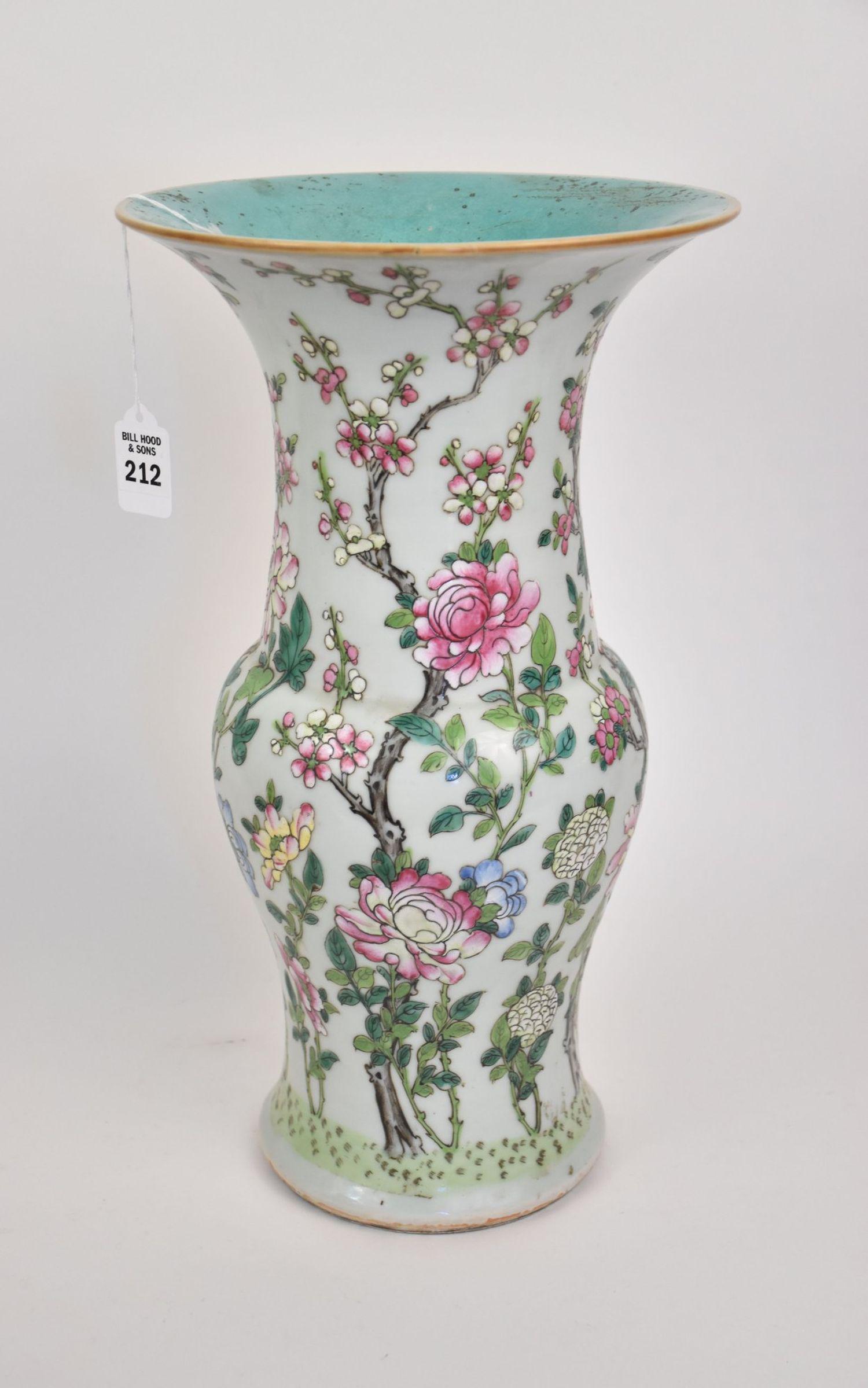 Chinese Famille Rose Celadon Ground Porcelain Flaring Vase - A flaring porcelain vase featuring: Chinese Famille Rose Celadon Ground Porcelain Flaring Vase - A flaring porcelain vase featuring floral branches in Famille Rose enamels on a celadon glazed ground. 15 5/8" h x 9" diameter. Condition: