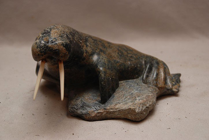 Inuit soapstone carving of a walrus, 4"h x 8"w: Inuit soapstone carving of a walrus, 4"h x 8"w