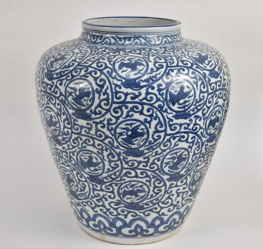 Large Chinese Blue & White Porcelain Jar - A large jar decorated with foliate scrolls and bird: Large Chinese Blue & White Porcelain Jar - A large jar decorated with foliate scrolls and bird medallions. Six-character Jiajing mark at shoulder of jar in blue underglaze. 16 1/4" h x 15" w.