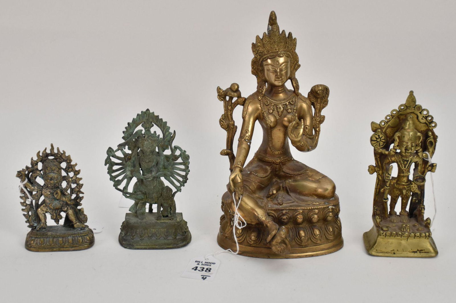 Group of Four Bronze Buddhist and Hindu Deity Figures - Group comprising: a Tibetan Green Tara (1 of 8)