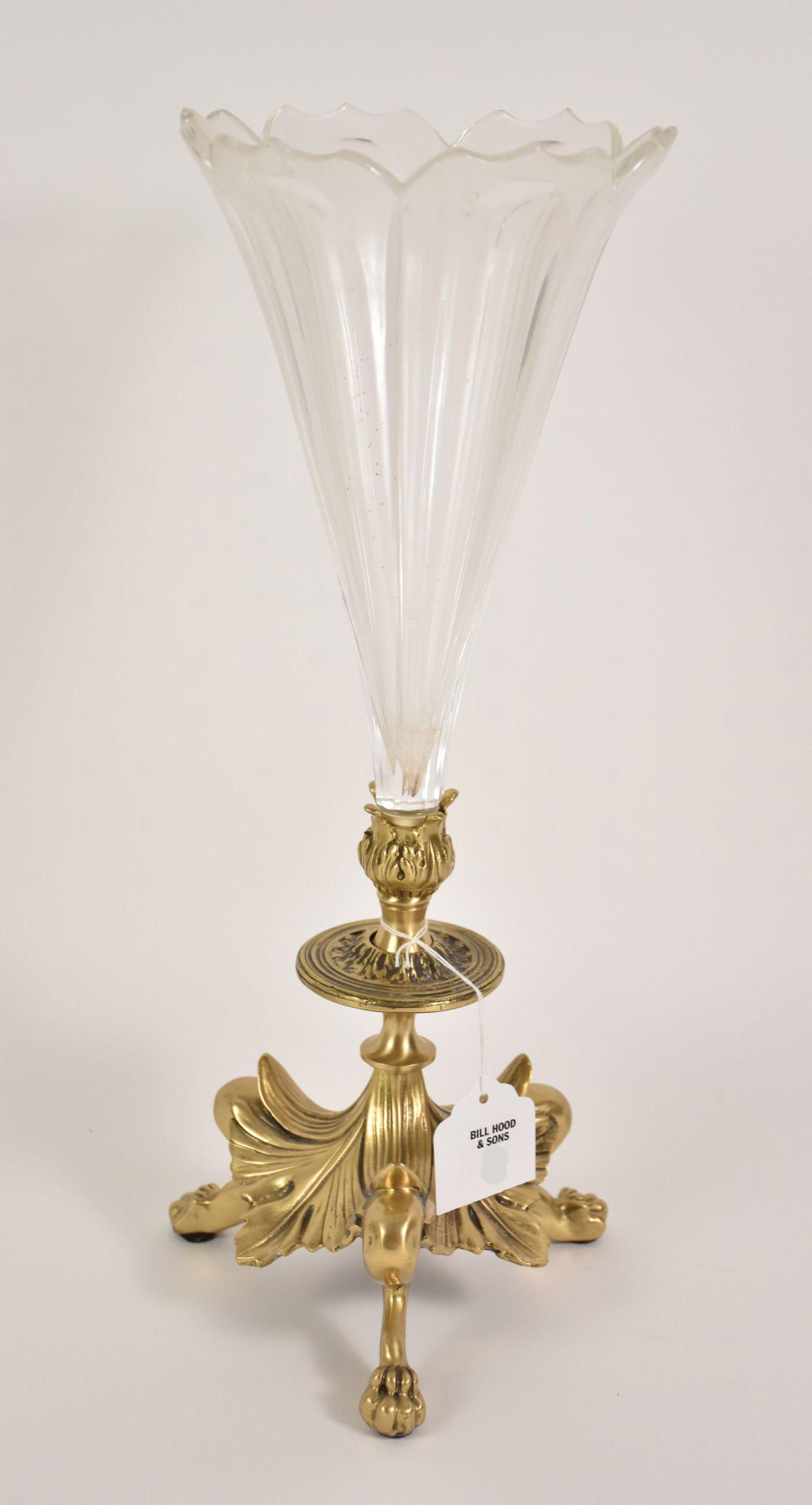 French Crystal & Gilt Bronze Tripod Vase - A crystal trumpet vase with a scalloped "petal-form" rim.: French Crystal & Gilt Bronze Tripod Vase - A crystal trumpet vase with a scalloped "petal-form" rim. Gilt bronze tripod base featuring leaf details and padded feet. Unsigned. 16 3/4" H. Condition: Min