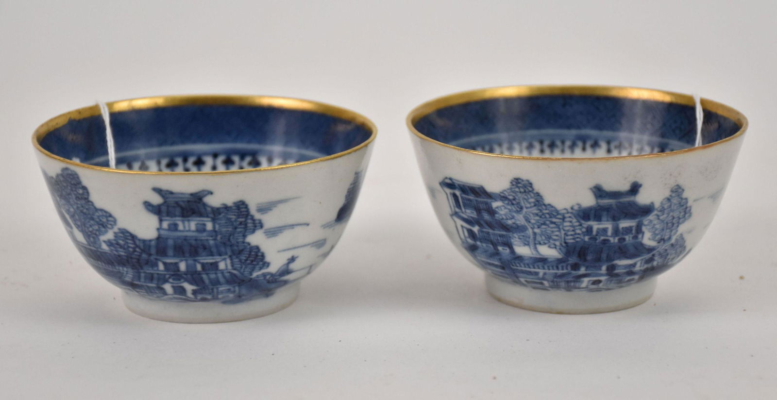 Two Antique Chinese Blue & White Tea Bowls - Qing Dynasty. Two porcelain tea bowls, each featuring (1 of 4)