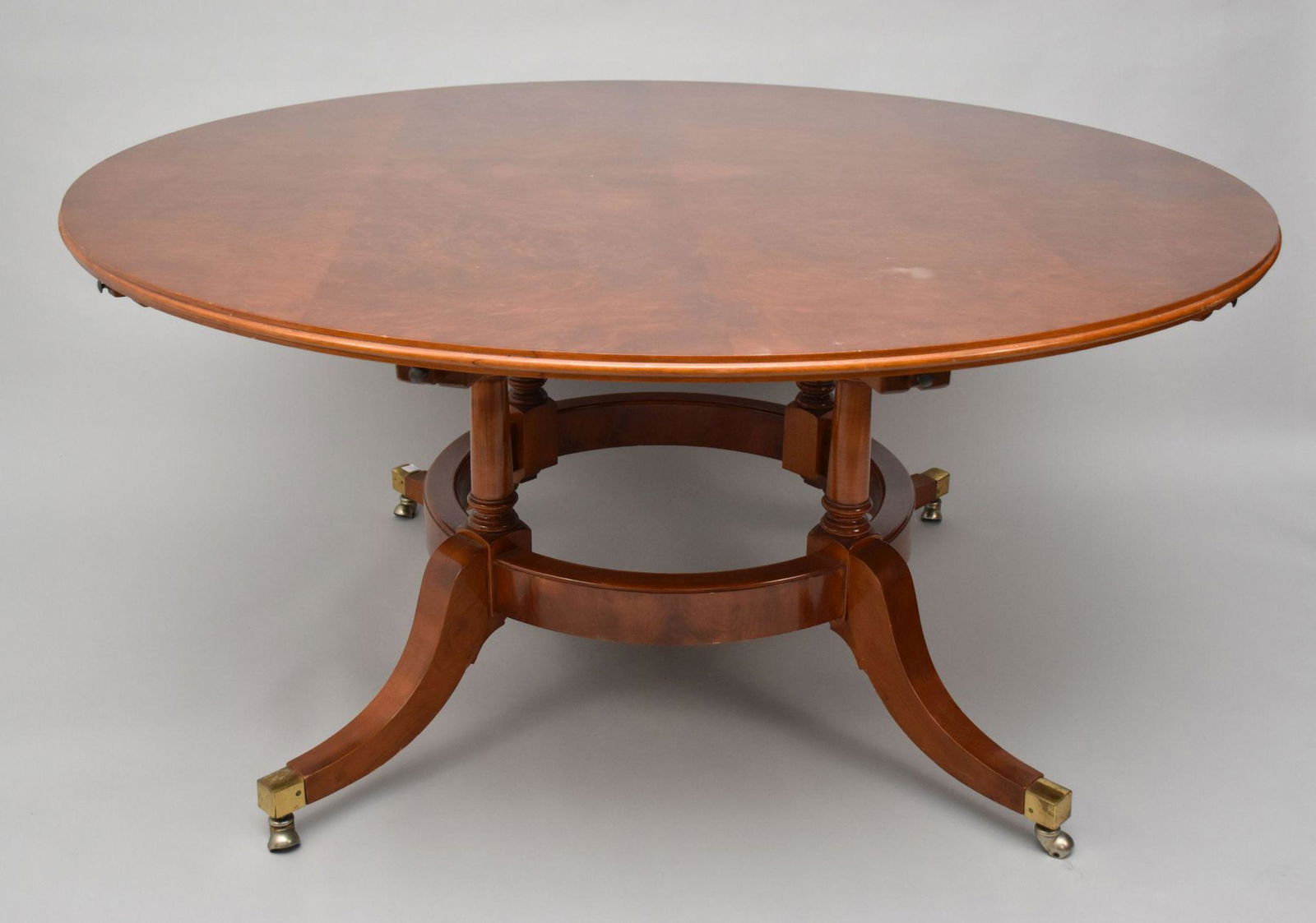 Mahogany Round Dining Table, Burled Surface with 4 Pedestal Support Leading to Downswept Legs, Brass (1 of 9)