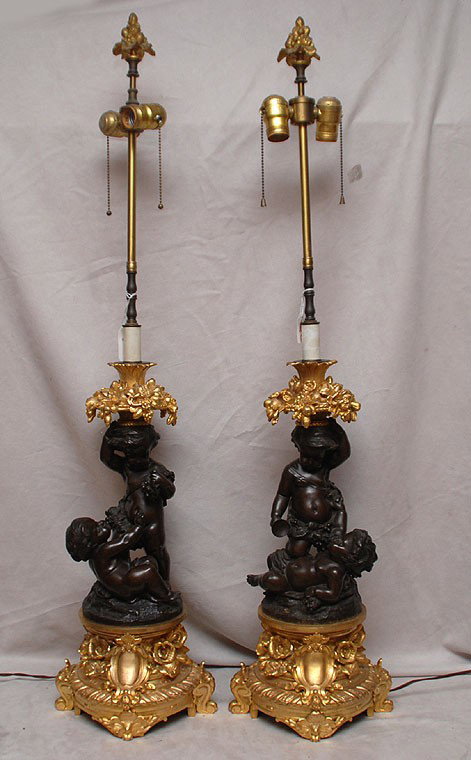 Pair of 19th c. French Bronze figural putti lamps,