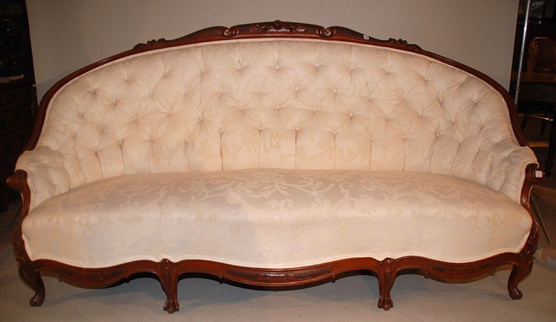 Continental carved wood frame sofa, rosette at cre: Continental carved wood frame sofa, rosette at crest, tufted back, shaped seat on 5 cabriole legs, off white linen sold with (as is) silk throw pillows, 38"h x 87"L