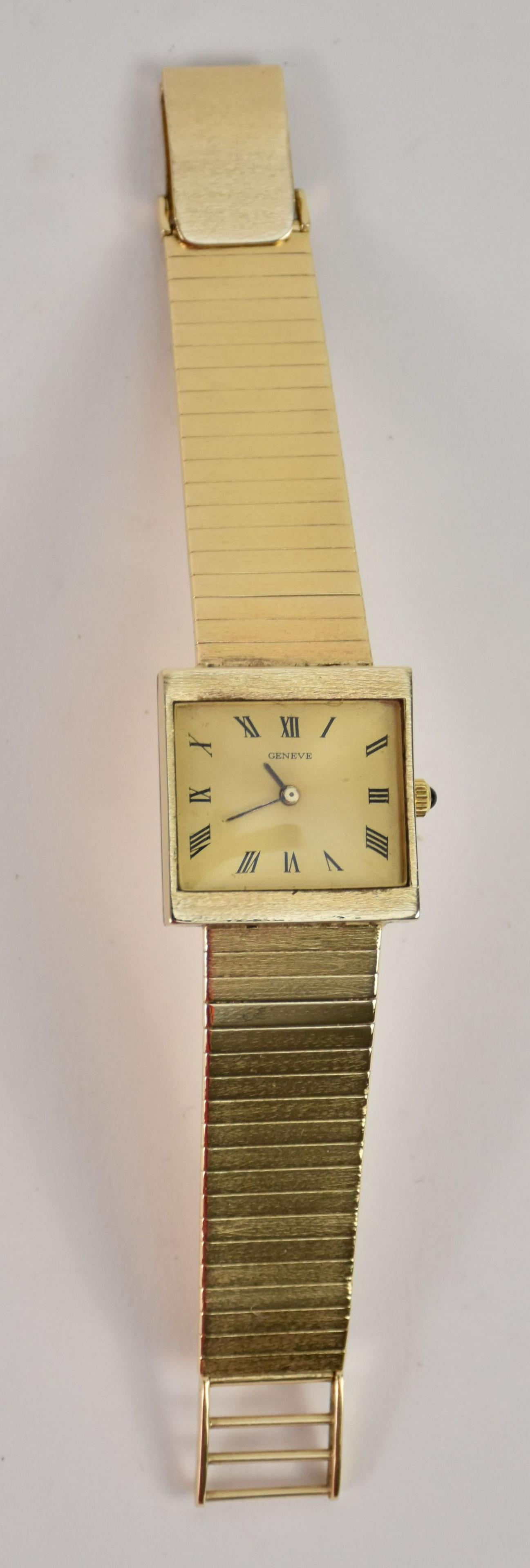 14Kt YG Geneve Swiss Watch with black enamel roman numeral time markers. Watch has a sapphire (1 of 4)