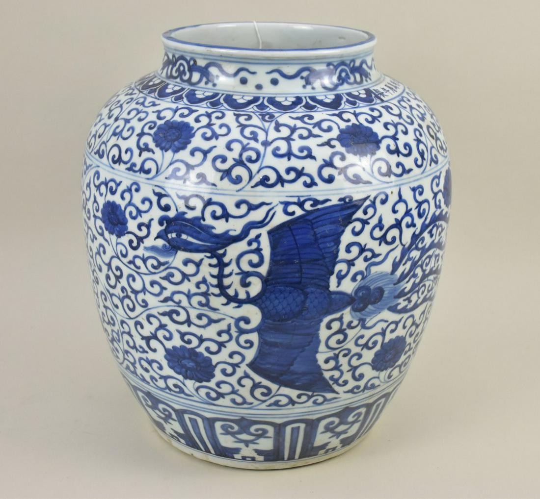 Large Chinese Blue & White Porcelain Jar - A large porcelain jar featuring phoenix flying across a (1 of 7)