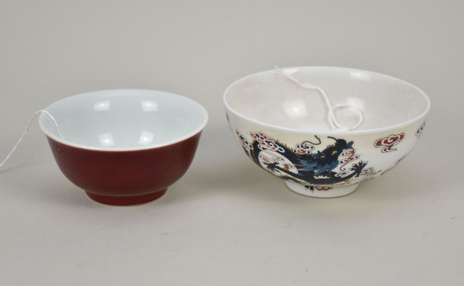 Two Chinese Porcelain Bowls  - Comprising: A) Sang de Boeuf porcelain tea bowl with oxblood red (1 of 5)