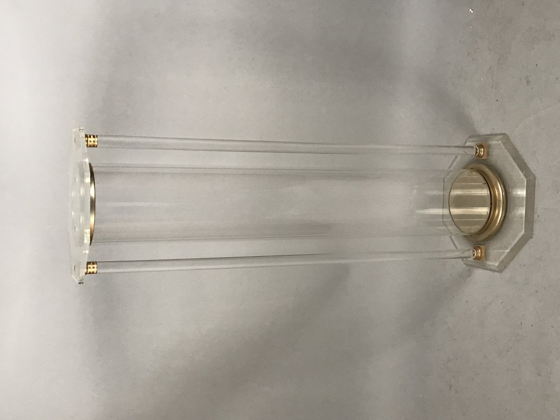 Modern Lucite column pedestal with brass accents: Modern Lucite column pedestal with brass accents. Hollow and accessible to put something inside if desired. Top has some scratching. 47 1/2"h x 14"w x 14" d