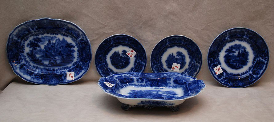 12 Flow blue pieces with similar border; 6 bowls, 2: 12 Flow blue pieces with similar border; 6 bowls, 2 small plates, 1 plate, bowl, medium-size platter, open vegetable bowl