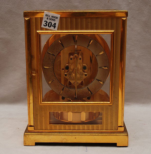 Jaeger Lecoultre Atmos clock, (brass is worn and n: Jaeger Lecoultre Atmos clock, (brass is worn and needs cleaning) 9"h x 7"w x 5