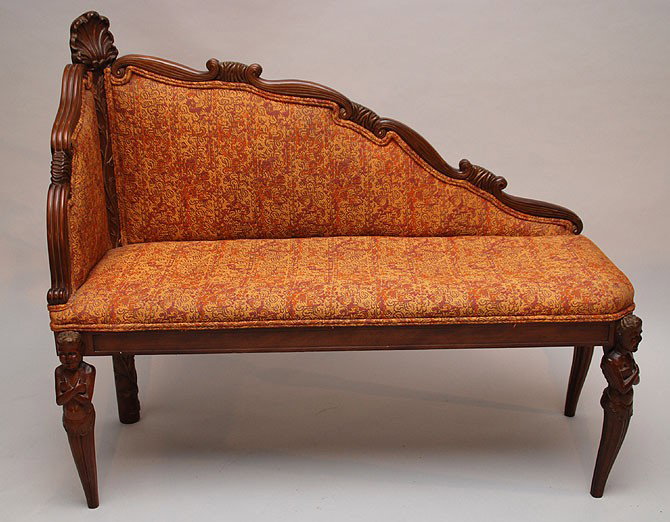 Corner seat with shell carved at top on 4 bust sup: Corner seat with shell carved at top on 4 bust supports