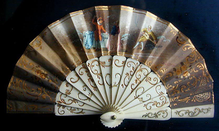 SIGNED ANTIQUE IVORY FAN A hand painted paper and : SIGNED ANTIQUE IVORY FAN A hand painted paper and ivory antique fan in a contemporary shadow box frame, signed; size 11"" x 15"", very good condition."