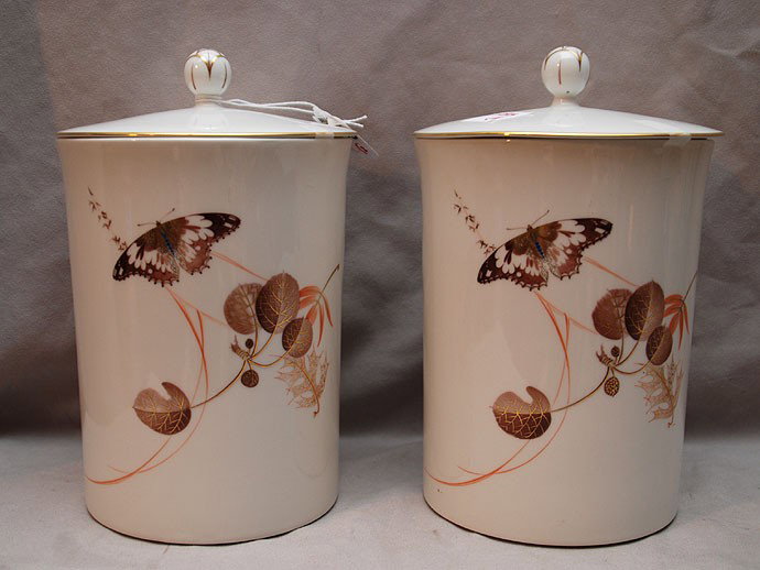 Pair contemporary KPM covered canisters, leaf and: Pair contemporary KPM covered canisters, leaf and butterfly design, 9 1/2"h x 6"dia