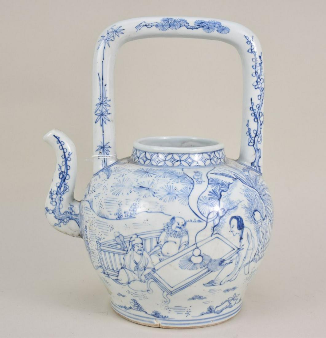 Chinese Blue & White Porcelain Teapot - A porcelain teapot with a high square handle. Decorated with (1 of 9)