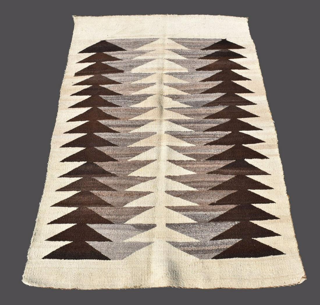 Navajo Geometric Woven Wool Rug Blanket - American. A hand-woven wool rug with a cream ground and (1 of 3)