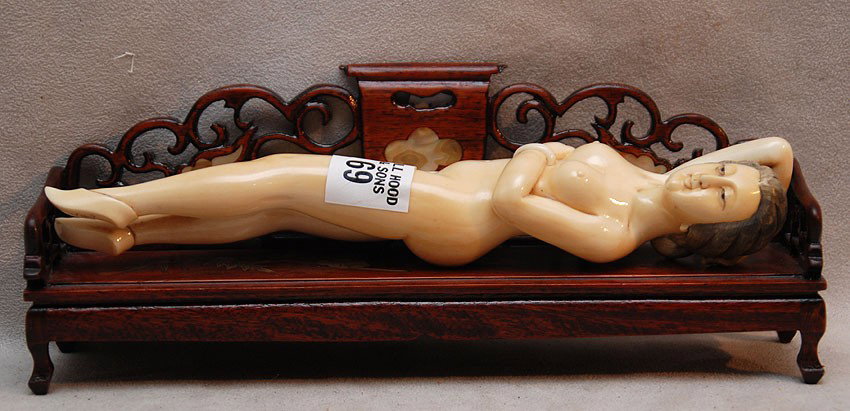 Chinese ivory reclining doctor doll on settee, 9"L: Chinese ivory reclining doctor doll on settee, 9"L