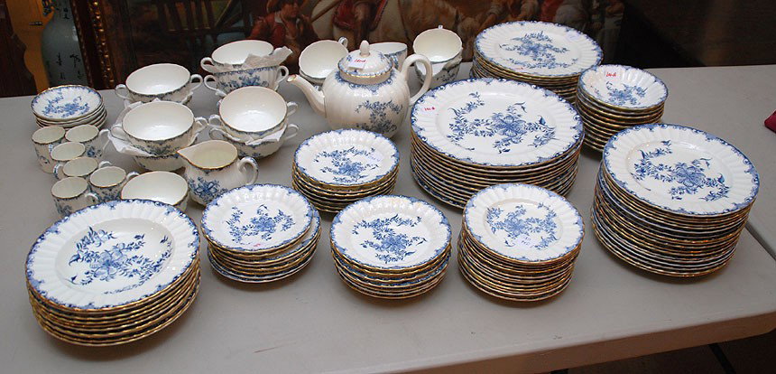 Royal Worcester partial dinner service in the Man: Royal Worcester partial dinner service in the Mansfield pattern, 20th c, blue floral sprays on a white ground with gold border, incl; 12 dinner plates, 12 luncheon plates, 11 dessert bowls, 13 bread &