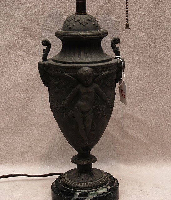 Pot metal lamp with puttis on circular metal base,: Pot metal lamp with puttis on circular metal base, 24"h