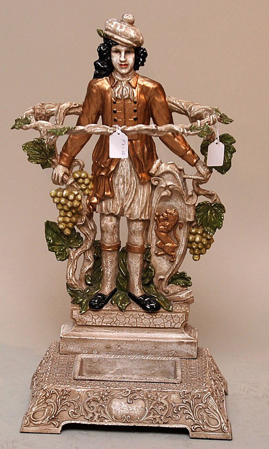 Cast iron figural umbrella stand, 26"h x 13"w: Cast iron figural umbrella stand, 26"h x 13"w