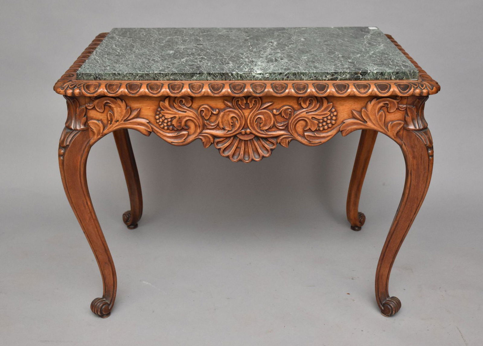 Continental Occasional Table with carved apron on cabriole legs, green marble top, 31"h x 40"w x (1 of 4)