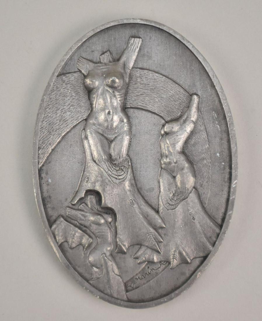 Jorge Marin (Mexican b. 1963-). A heavy relief bronze/pewter oval plaque artwork. One side depicts 3: Jorge Marin (Mexican b. 1963-). A heavy relief bronze/pewter oval plaque artwork. One side depicts 3 nude acrobat women. The other side a calendar of 1998. The artwork was commissioned by the cities o