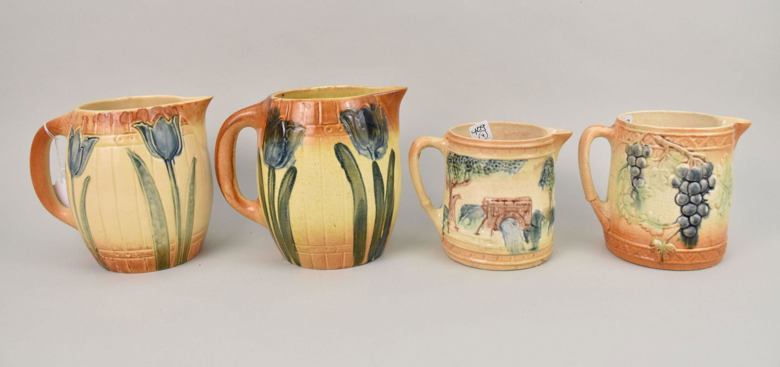 4 Pottery Pitchers, 2 with Tulips, 1 with Grape Motif, 1 with Landscape (1 of 11)