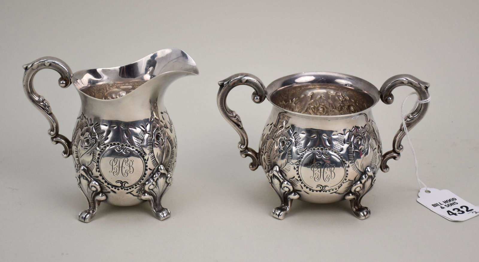 Sterling Silver Creamer & Sugar Bowl. Hand Chased weight 18ozt creamer 4" x 4.5" and sugar bowl 3" x: Sterling Silver Creamer & Sugar Bowl. Hand Chased weight 18ozt creamer 4" x 4.5" and sugar bowl 3" x 5.5"