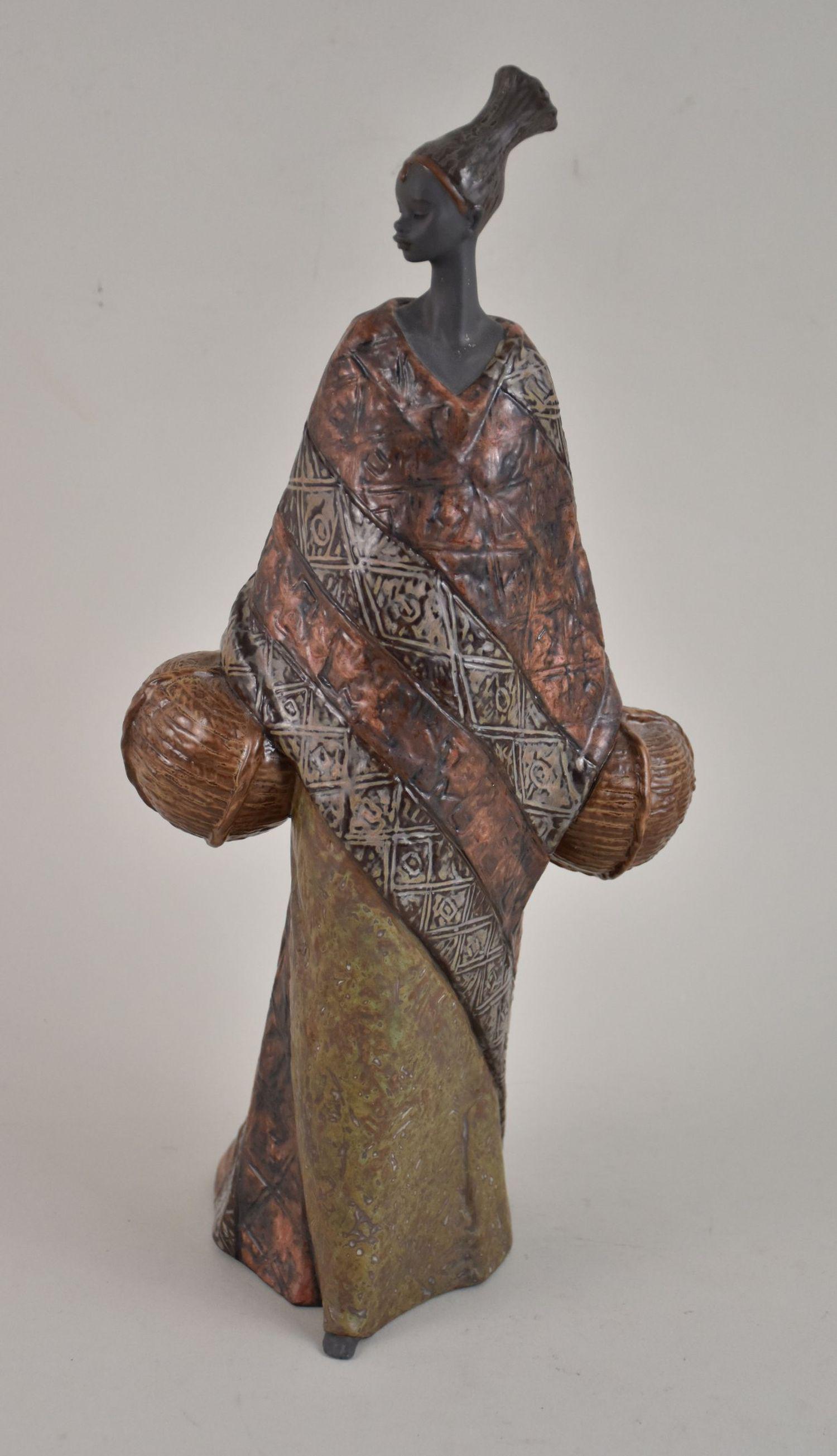 Lladro "Gifts of the Earth" Pulse of Africa Figurine - Lladro, Spain. Gifts of the Earth from the: Lladro "Gifts of the Earth" Pulse of Africa Figurine - Lladro, Spain. Gifts of the Earth from the "Pulse of Africa" series. Sculpted by Antonio Ramos. #01012478. 16" h. In original box.