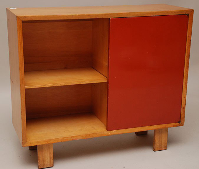 Diminutive Herman Miller bookcase, 1 red sliding do: Diminutive Herman Miller bookcase, 1 red sliding door with red leather reverse and brass nail studs, label inside reads George Nelson for Herman Miller, Zealand MI, 29 1/2"h x 34"w x 12"d